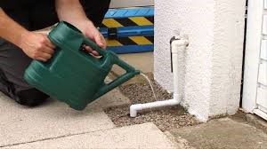 pouring watering can on pipe | Planned Preventative Maintenance
